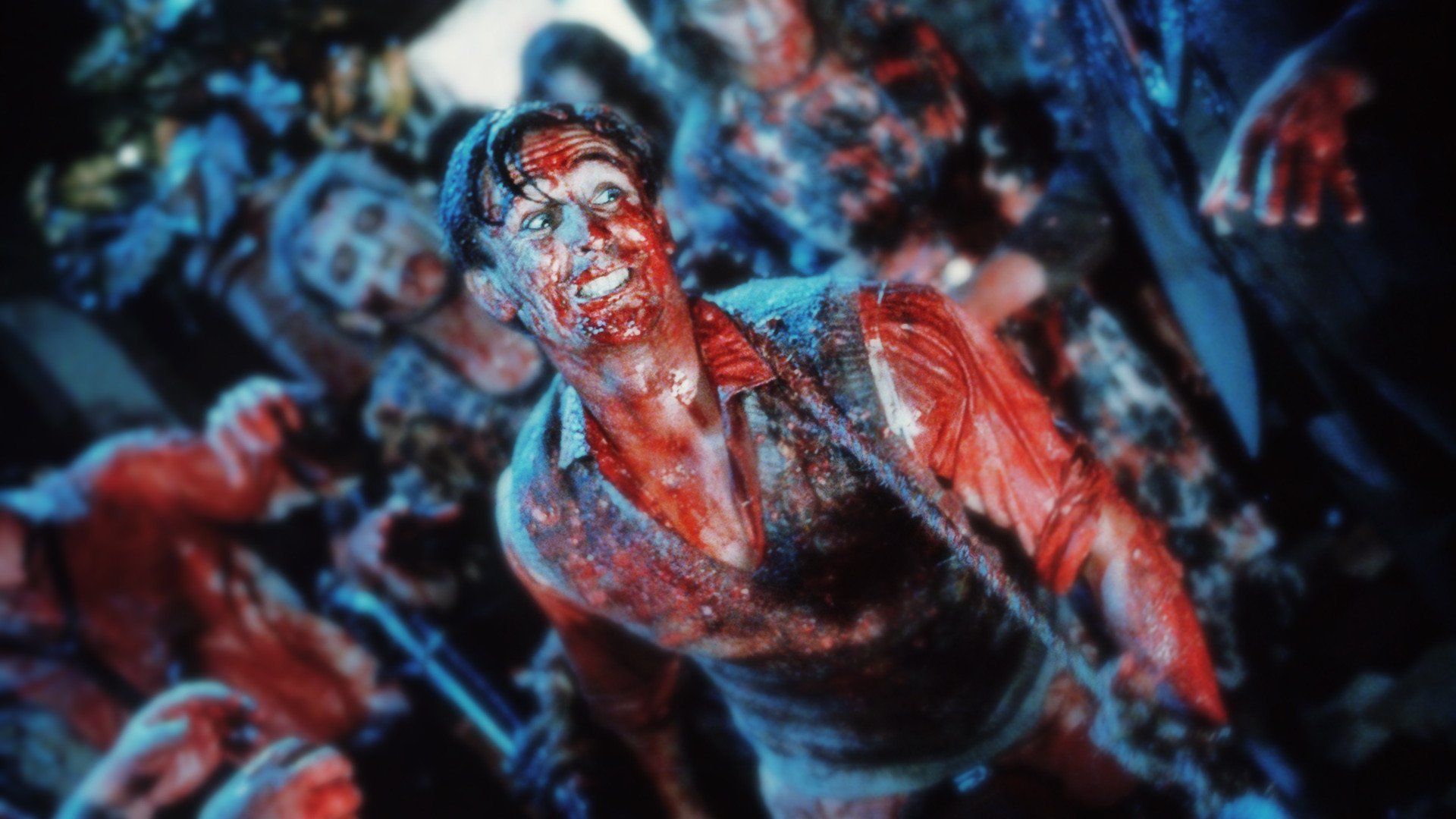 «Braindead / Dead Alive»: герой с широкой улыбкой и зомби-хаос вокруг.